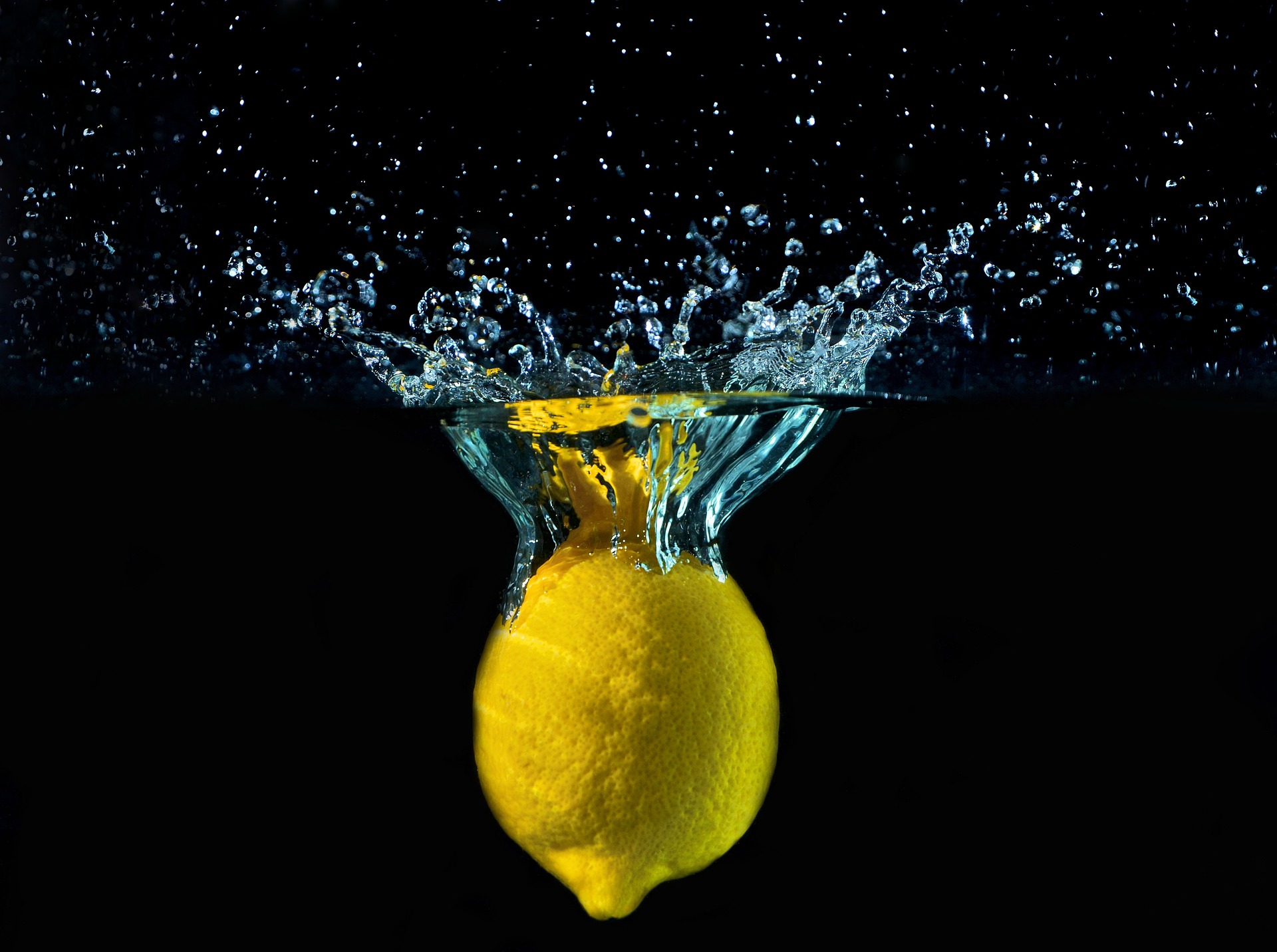 a lemon submerged in water