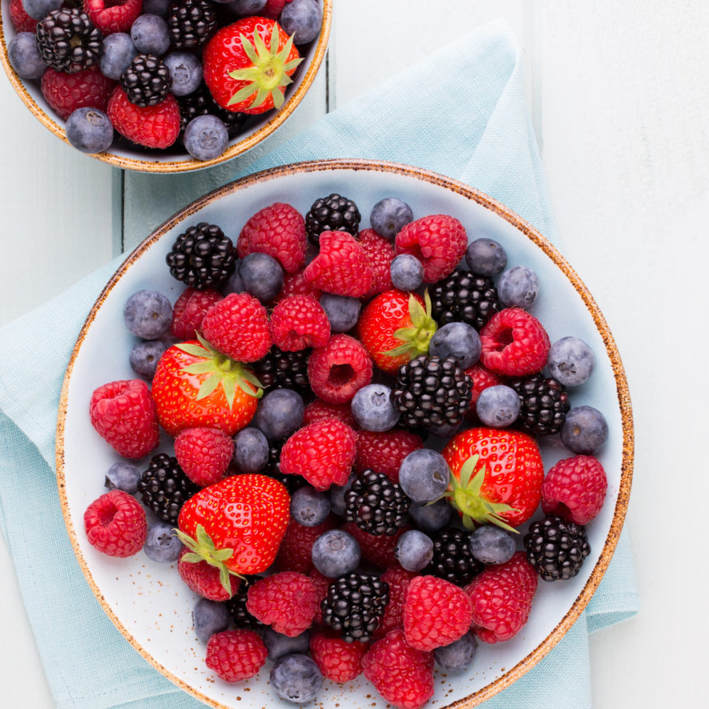 a bowl of colorful, low sugar berries
