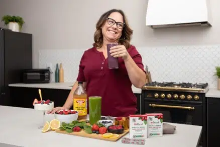 smiling woman with smoothie