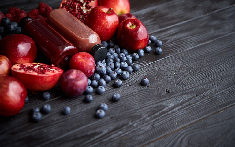 blueberries, apples, and pomegranates