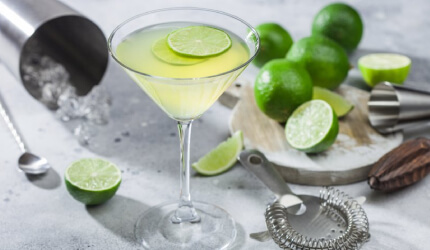 lime martini with limes all around